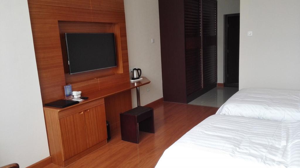 Weihai Times Business Hotel Chambre photo